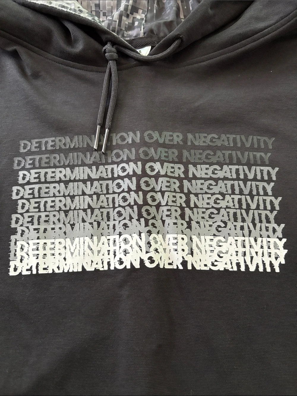 adidas Black Hoodie with Repeated 'Determination Over Negativity' Chest Graphic